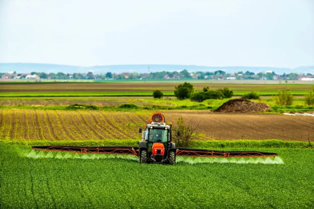 harvester on green field