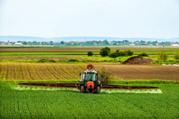 harvester on green field